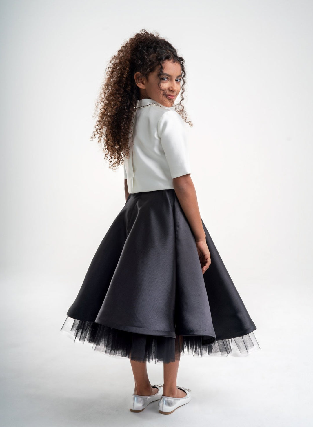Girls' White Top with Black Skirt