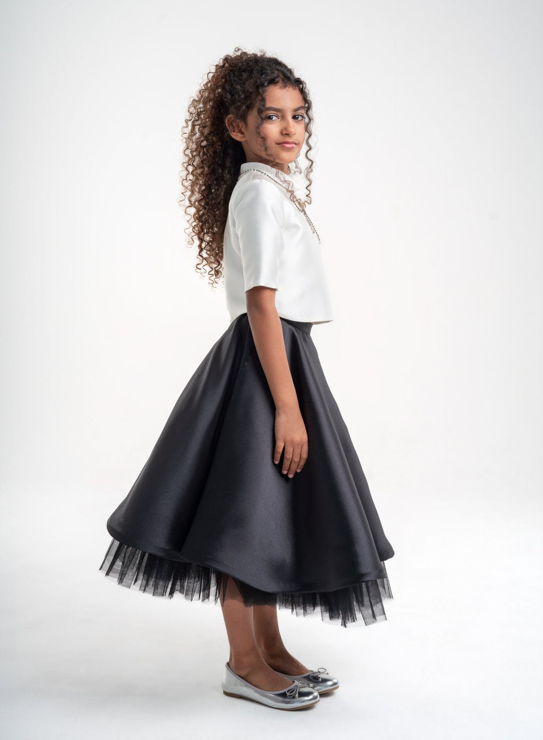 Girls' White Top with Black Skirt